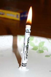 A crayon can be used as a candle in an emergency.