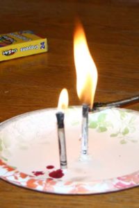 Burning crayons like a candle