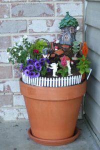 Hillside Fairy Garden- a little growth helps to hold the dirt in place