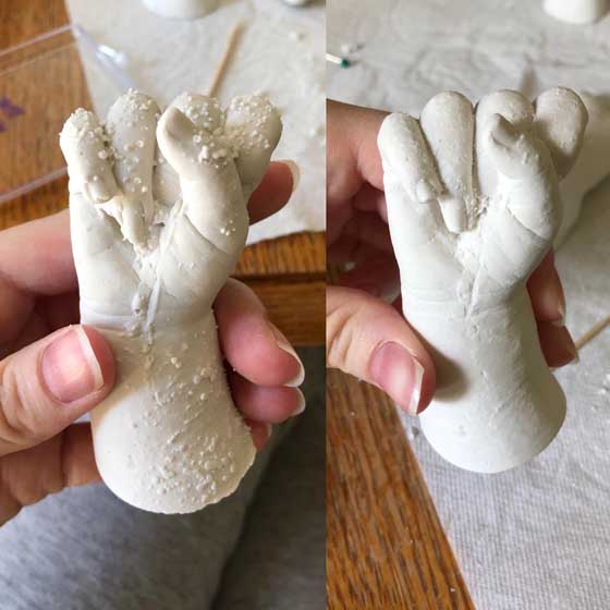 Molds of baby hand, cleaning up imperfections