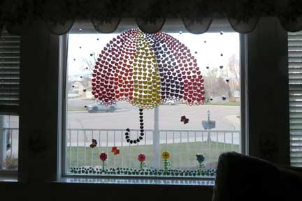 Heart pictures during quarantine- umbrella rainbow and blue raindrops-looking out